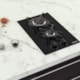 Cooktop a Gás Dominó em Vidro Temperado Preto com Trempes em Aço Carbono e Acendimento superautomático 2 Bocas Tramontina - 282e4f86-af4d-48a6-b2a0-3d74375ce924